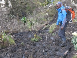 William Kiminywa finds a path through the mud.